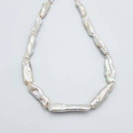 פנינים אמיתיות מתורבתות 22X7ממ, חור 1 מ"מ, כ-40 ס"מ בשורה